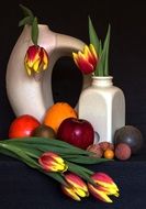 still life of tulips and exotic fruits