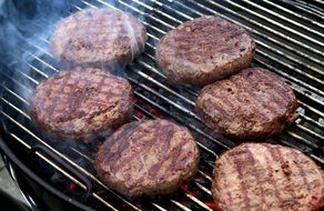 cooking of rissoles on the grill