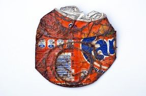 flattened can from Fanta