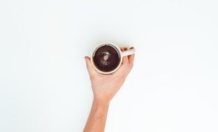 cup of warm aromatic coffee