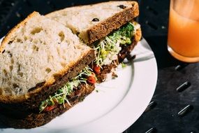 Vegetarian sandwich and juice for a lunch