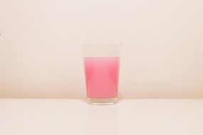 pink drink in a grass