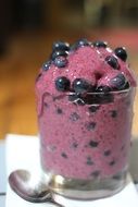 frozen blueberry puree in a glass beaker
