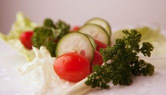 mixed salad with tomatoes close