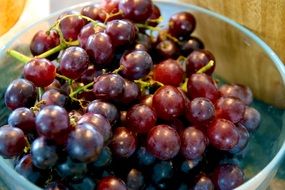 black grapes in a bowl
