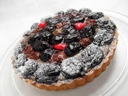 cake with fruit on a white tray