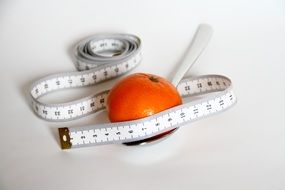 orange is a fruit for weight loss and tape measure