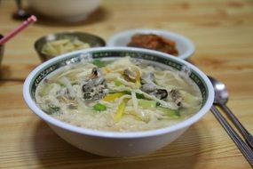 haemul-kalguksu, korean noodle soup on table