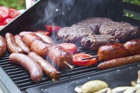 tasty sausages are fried on grill