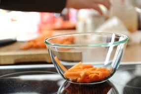 sliced carrot in a deep plate in the kitchen