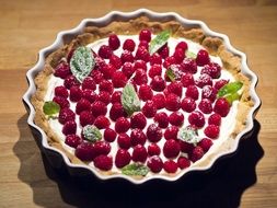 Baked sweet tark with a raspberries