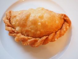 empanada is a stuffed bread