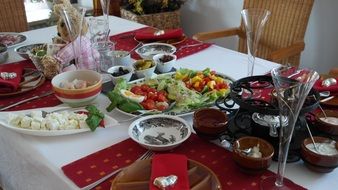 Fondue and other snacks on a table