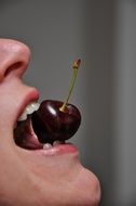 cherry in mouth