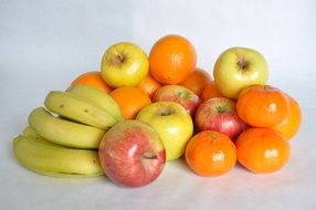 fruit mix with bananas, tangerines and apples