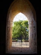 wrought iron lattice in the passage in a temple in Burma