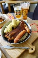 wsausage with ribs to beer