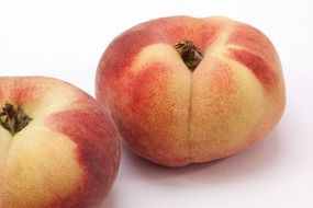 two ripe peaches