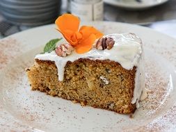 dessert with a flower on a plate in a restaurant