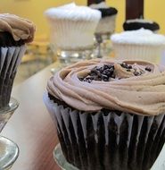 chocolate muffins with cream icing