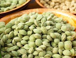 green almonds in a bowl on the market