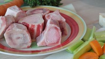 soup bones with carrots and leek