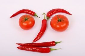 funny face of red pepper and tomato