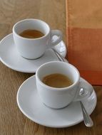 Hot,tasty coffee served in coffee cups