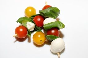 cherry tomato with mozzarella on a plate