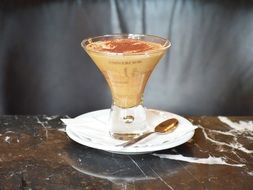 picture of coffee drink in glass cup on saucer