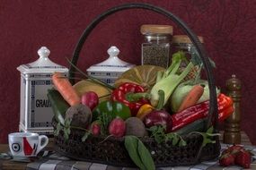 still life with a basket of vegetables