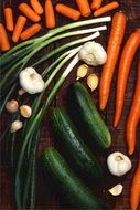 green onions, cucumbers, garlic and carrots