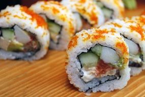 delicious Japanese rolls on a cutting board close up
