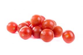 pile of ripe cherry tomatoes, isolated