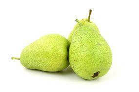 three green pears on white background