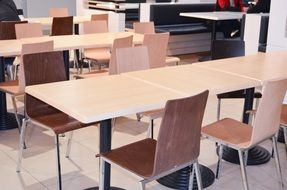 tables for eating and chairs in interior
