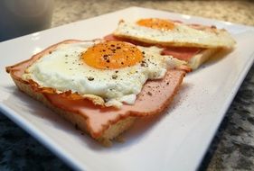 Fried eggs and toasts