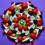 sliced fruits and berries