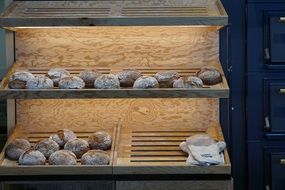 bread on shelves in shop