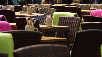 tables and chairs in a street cafe