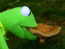 kermit frog eats mushroom
