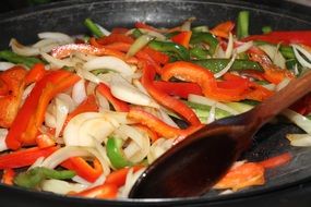 red and green peppers in a salad