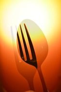 spoon and fork at hot background