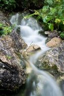 source through stones
