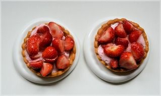 two sweet baskets with strawberries