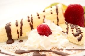 dessert with banana and whipped cream