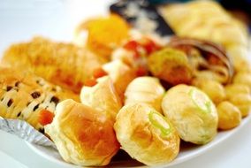 buns with various fillings on a plate