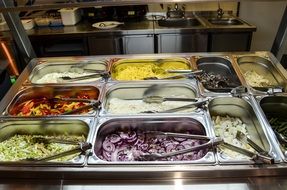 containers with food in the kitchen