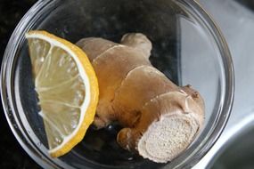 ginger and lemon in a glass cup