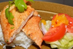 fried pork with rice and vegetables
